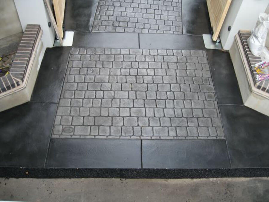 Pattern imprinted concrete driveway and flagstone
